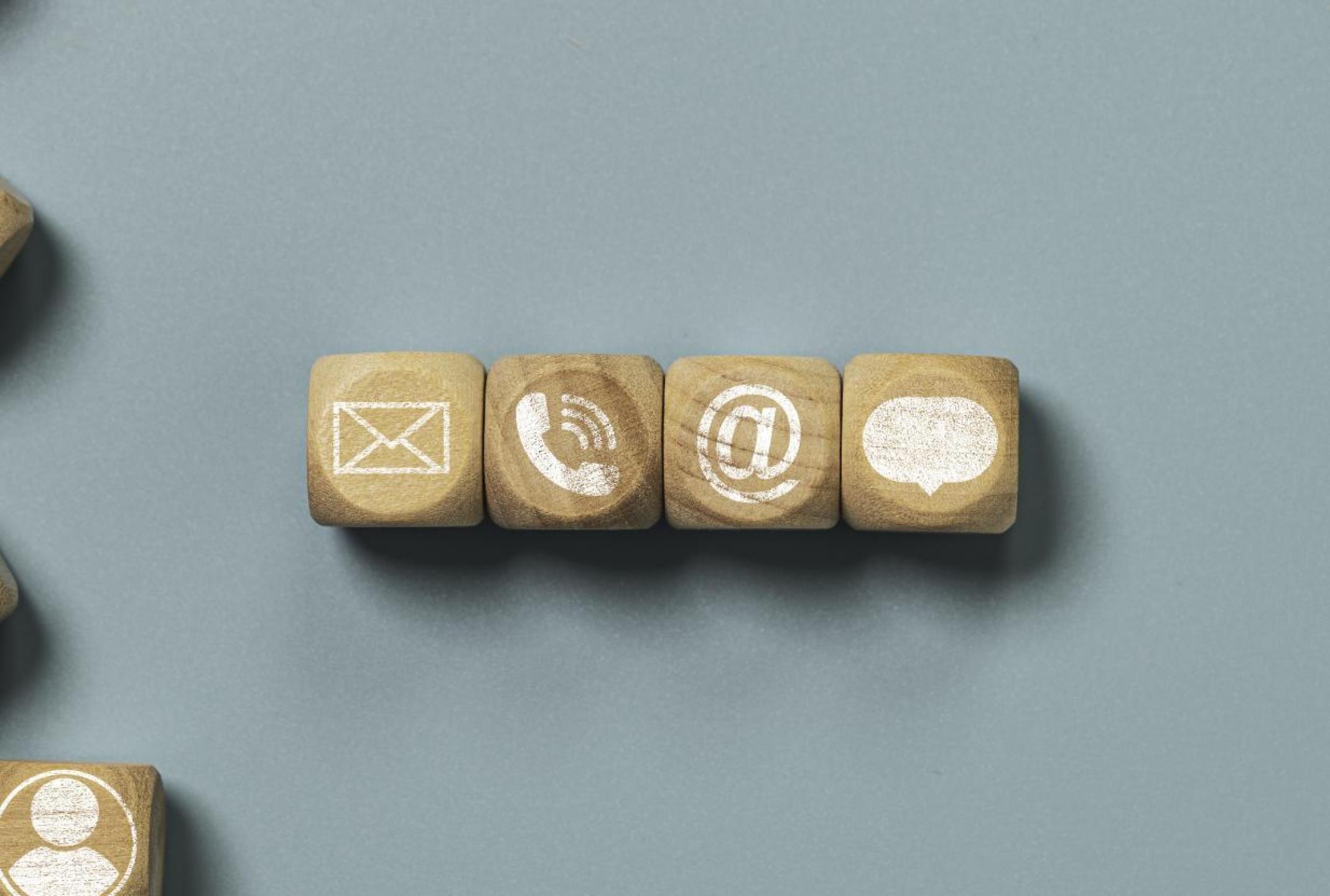 customer-service-business-contact-concept-wooden-cube-block-which-print-screen-letter-telephone-email-address-message