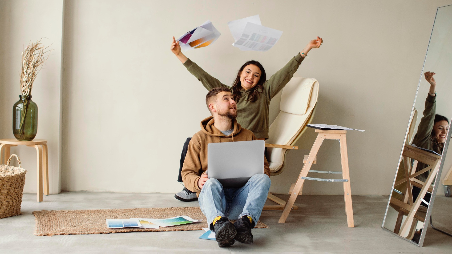 full-shot-couple-with-laptop